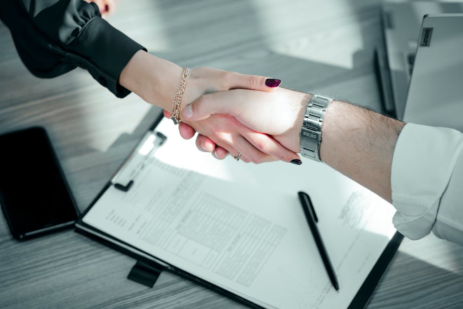 business contract handshake corporate agreement