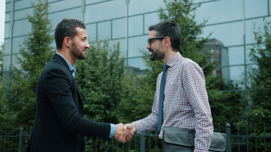 fitness trainers meeting handshake business deal