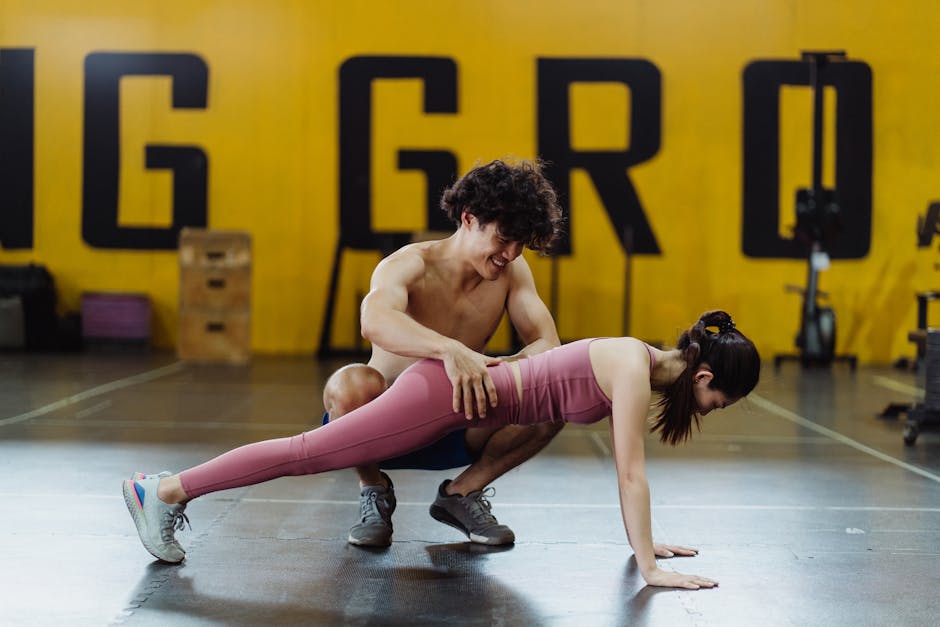 fitness trainer teaching corporate employees exercise