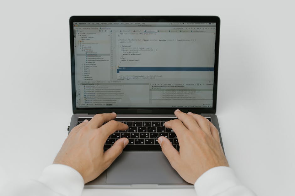 software quality assurance developer working laptop